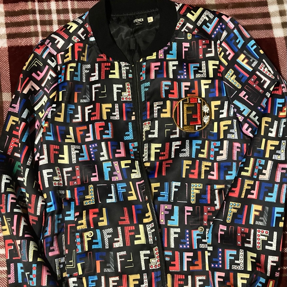 This is a Fendi fun fair bomber jacket,  in good excellent conditionon